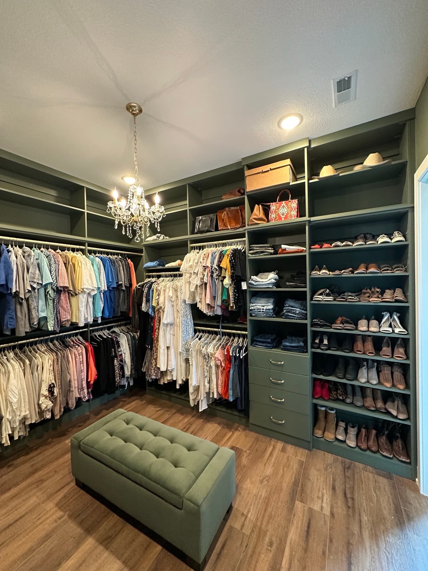 Green Residence walk-in closet with white built-ins