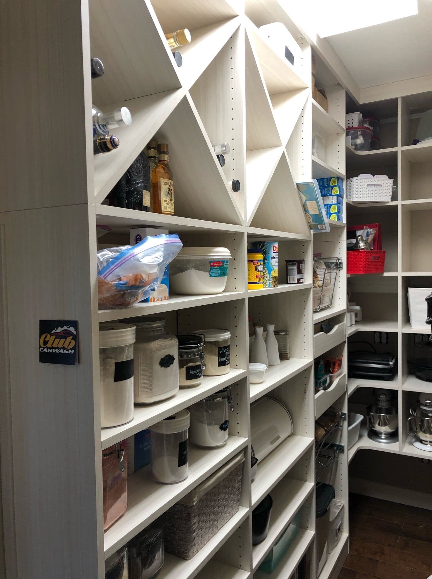 Custom pantry with wine rack and pull-outs